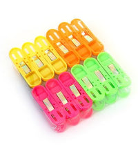 Multicolor non-slip plastic clips for secure cloth drying.