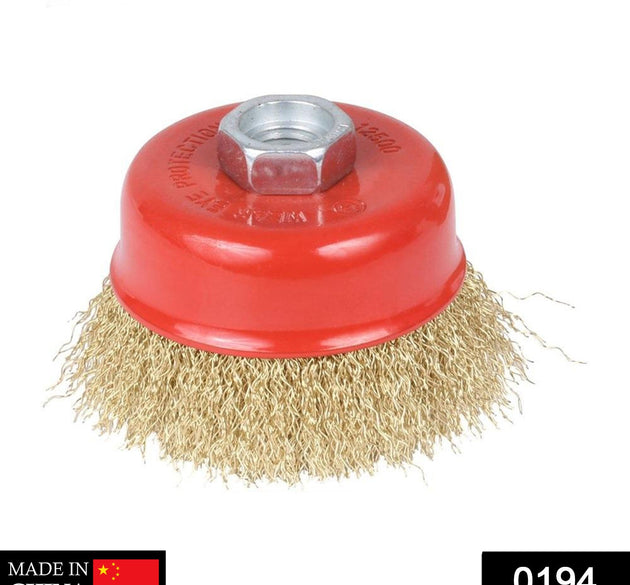 Gold wire wheel cup brush for heavy cleaning.