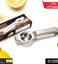 Close-up of stainless steel lemon squeezer.