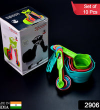 Set of plastic measuring spoons and cups for cooking and baking