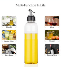 Clear plastic oil bottle, 1 liter, for convenient oil dispensing.