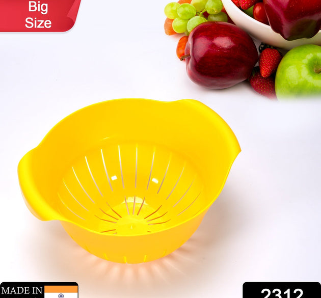 Bowl with strainer for washing fruits and veggies.