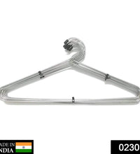 Set of 12 stainless steel hangers for efficient clothes storage.