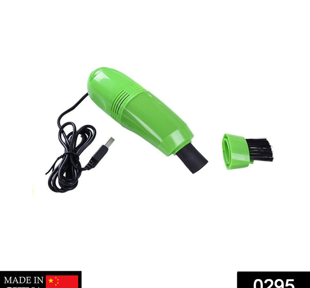 Compact USB-powered mini vacuum cleaner for cleaning computers and cars.