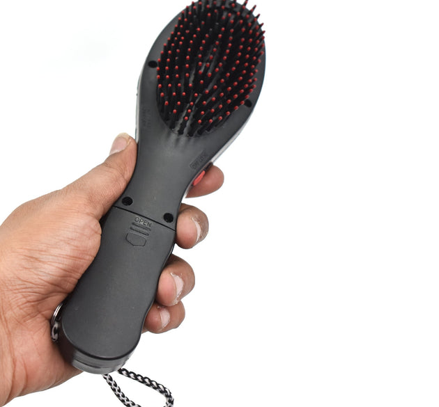 Electric vibrating massager comb for hair with brush.