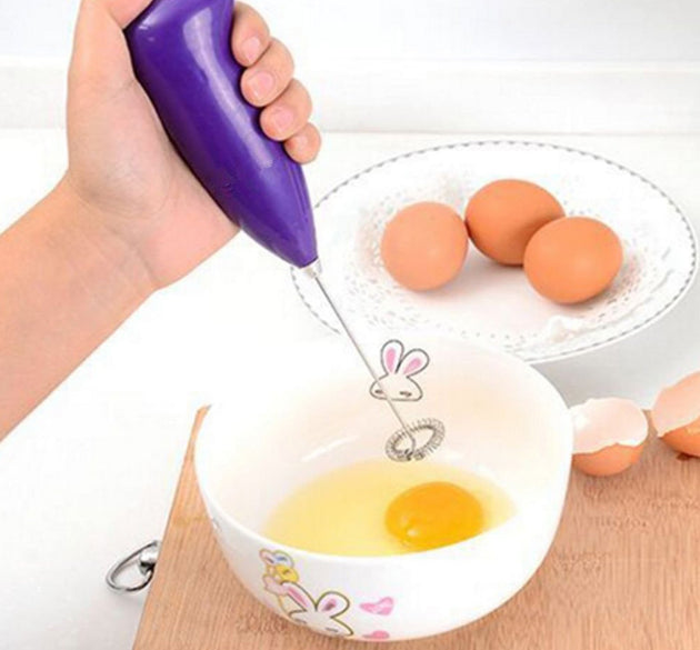 Hand blender for mixing and blending food.