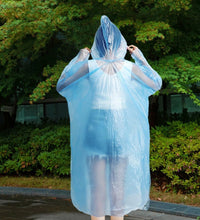 Clear rain coat for keeping clean and dry in wet conditions