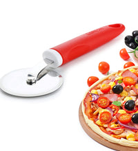 Ganesh pizza cutter, stainless steel wheel, shown in use.