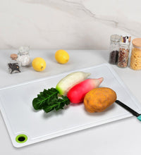 Handy plastic chopping board for kitchen tasks