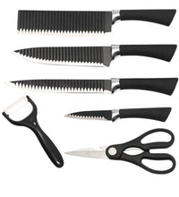 Set of stainless steel knives with included peeler