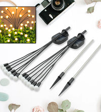 Solar garden lights with firefly design, warm light