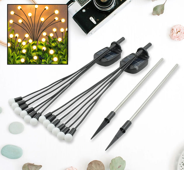 Solar garden lights with firefly design, warm light