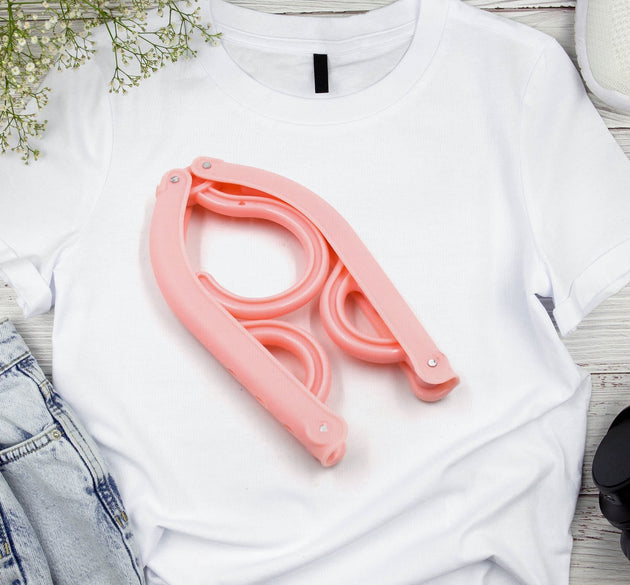 Portable folding clothes hangers for various garments, ideal for travel.