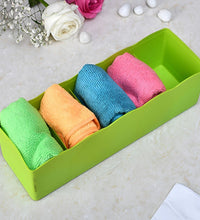 Drawer organizers with multiple compartments, ideal for socks and small items.