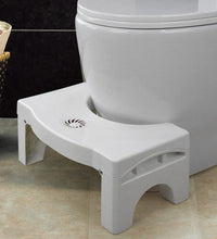 White non-slip toilet squat stool, easily foldable for convenience.