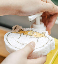 Absorbing dishwashing pad