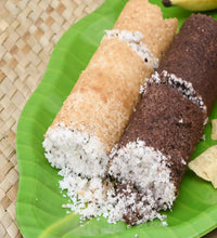 Black handle and metal steamer for making puttu