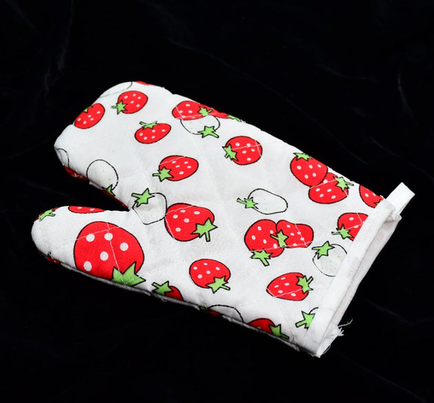 Colorful designer oven mitt and pot holder set, perfect for kitchen use.