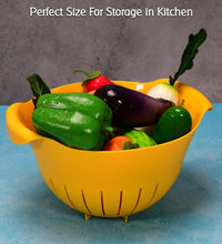 Bowl with strainer for washing fruits and veggies.