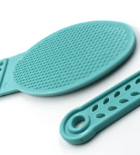 Plastic foot scrubber for effective pedicure.