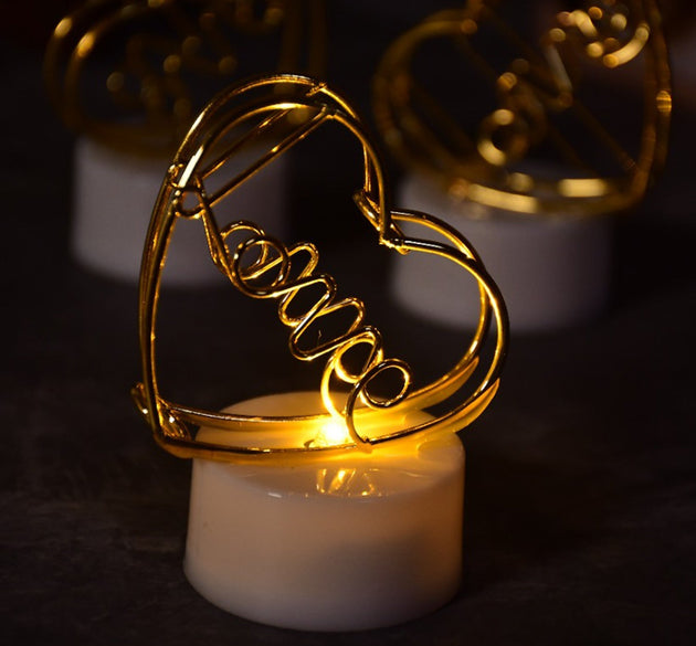 Multicolor flameless heart candles for decor.