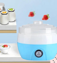 Complete view of the yogurt maker with accessories.