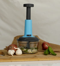 Food chopper with 3 stainless steel blades, close-up