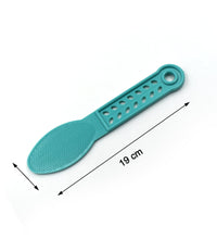 Plastic foot scrubber with textured surface.