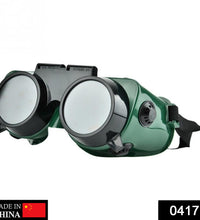 Large dark green welding goggles for protection.