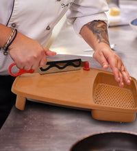 Cutting board with holder for easy chopping and slicing.