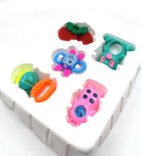 Baby toy rattle with multiple vibrant colors and patterns for visual and tactile stimulation.