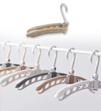 Versatile folding clothes hanger, adjustable and rotatable, perfect for travel