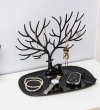 Stylish deer-shaped earring and necklace holder.