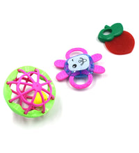 Set of three colorful baby rattles designed for sensory play and development.