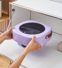 Foldable mini washer with drain basket, ideal for travel