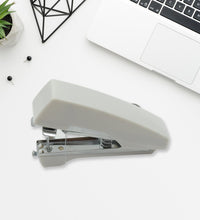 Pocket-sized manual sewing stapler