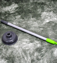 Toilet plunger with a red rubber cup, angled view