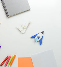 Colorful gun and plane-shaped erasers for children