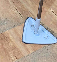 Extendable mop with rotating head, 360-degree cleaning.