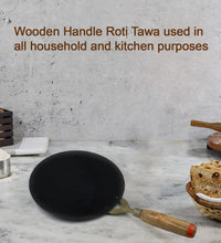 Nonstick roti tawa with wooden handle, perfect for daily use in kitchens.