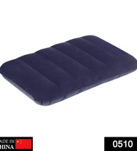 Velvet travel pillow in blue, inflatable.