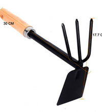 Wooden-handled double hoe tool for efficient gardening.