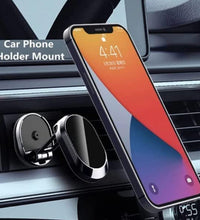 Compact metal car phone holder.