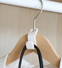 Set of non-slip plastic hangers.