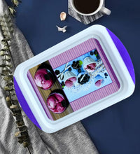 Medium plastic tray for versatile use in kitchen and other areas.