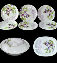 Complete dinnerware set with 32 pieces, including plates and utensils