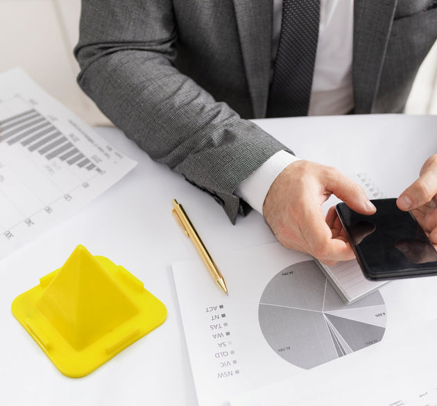 Four-sided pyramid mobile holder, versatile for desk and car use