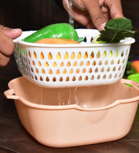 Strainer with basket feature for easy rinsing of food items