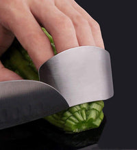 Adjustable stainless steel finger guard for safe slicing.