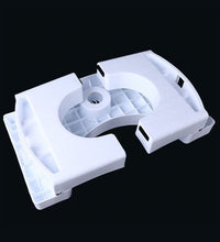 White plastic folding squat stool with anti-slip features.